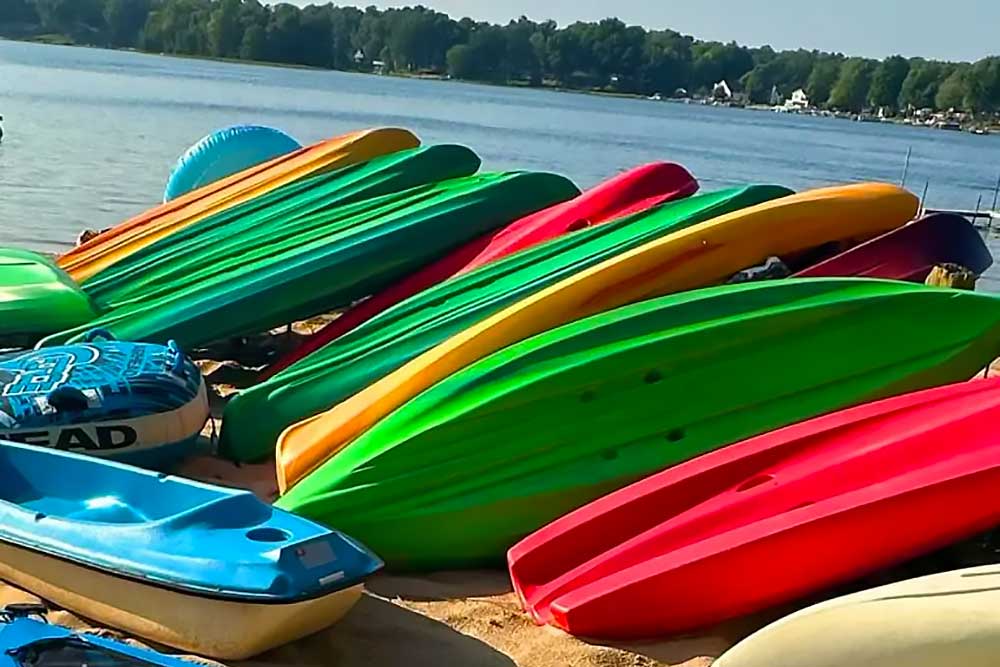 our-grounds-amenties-kayaks Kayaks on the water at South Shore Resort and Retreats western Michigan